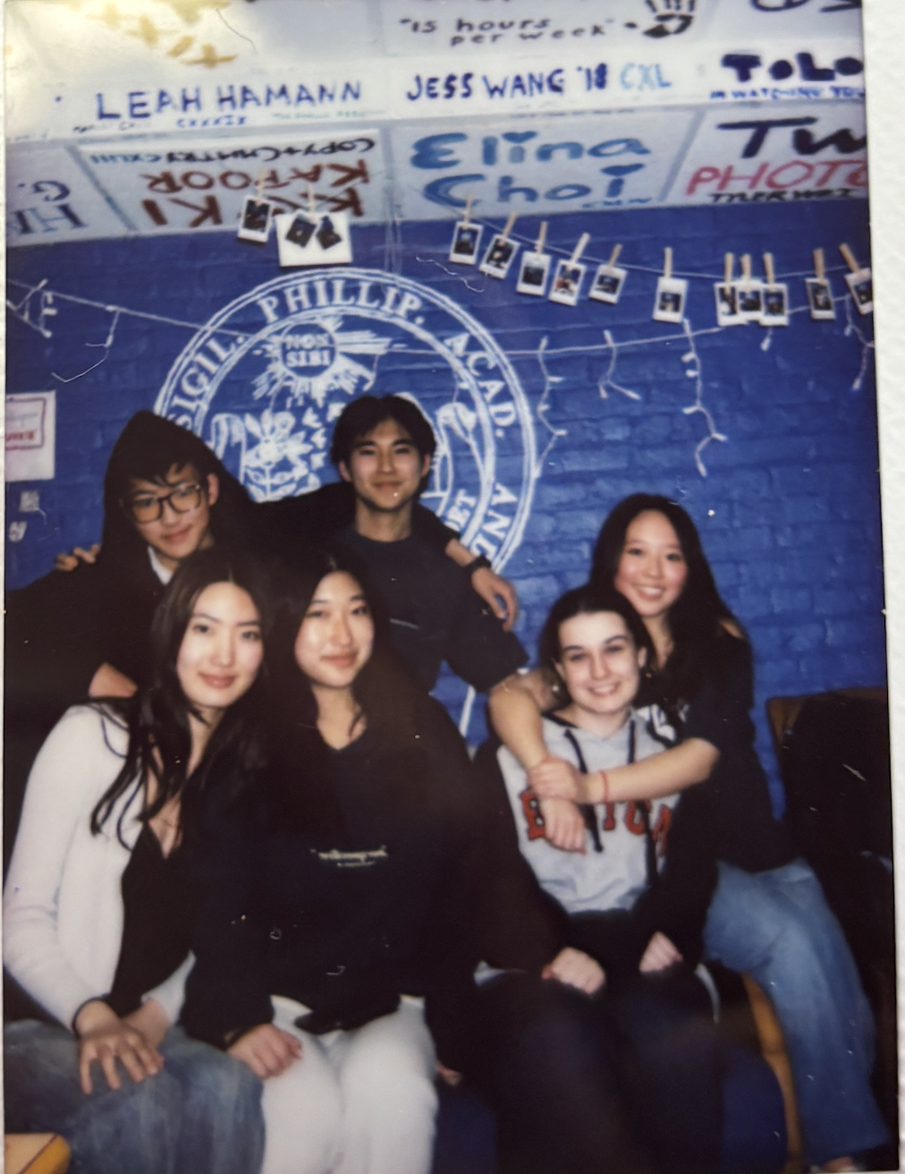 A polaroid photo of The Phillipian newspaper's Business Section in spring 2024.